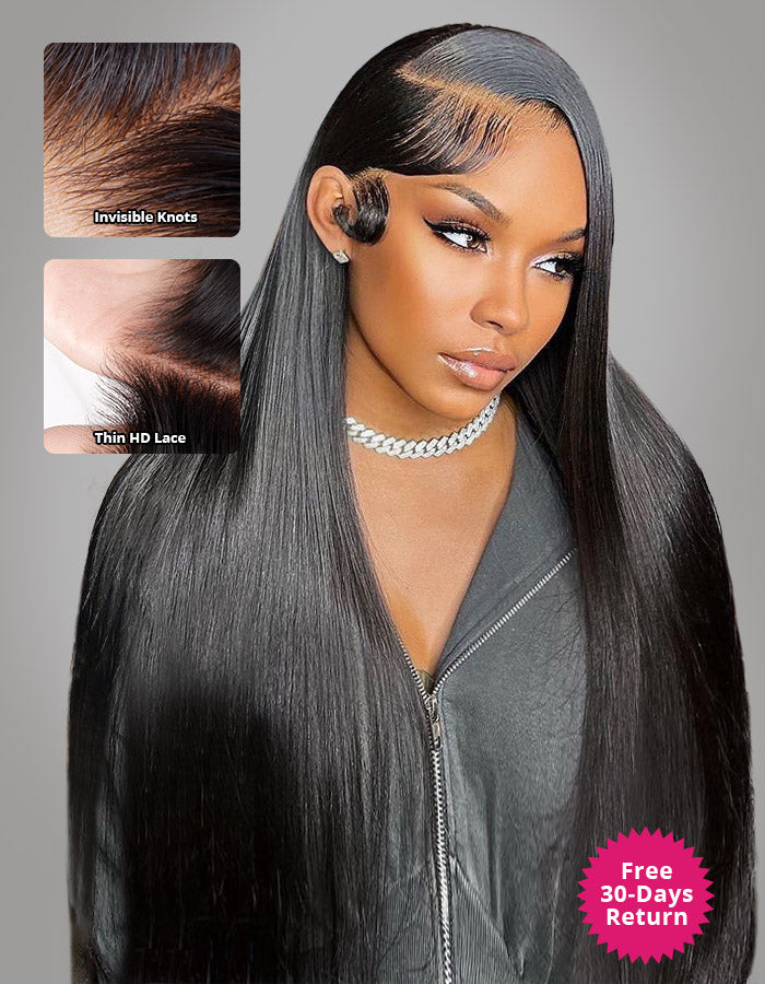 Woman with long, wavy, 30-inch HD lace frontal wig in natural black color, sitting in a stylish room with green walls.