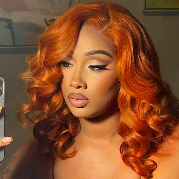 Ginger Orange Body Wave Wig Styled On a Model With Soft Curls and Side Part