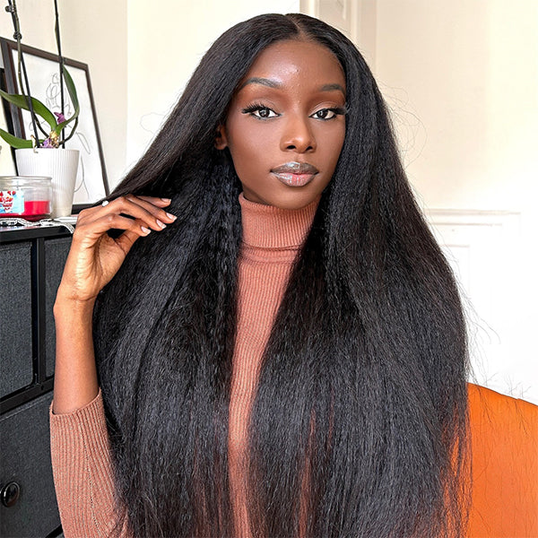 Model Showcasing Long, Kinky Straight Human Hair Wig in Natural Black Color
