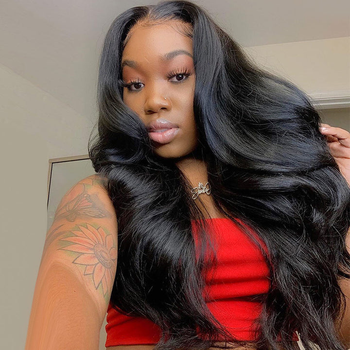 Woman With Long Body Wave Black Hair Wearing a Red Top
