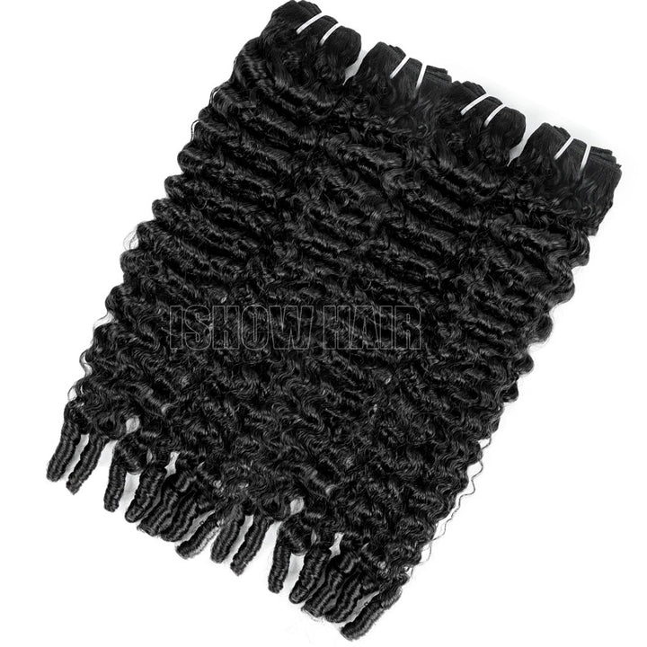 Four natural black human hair bundles on a white background