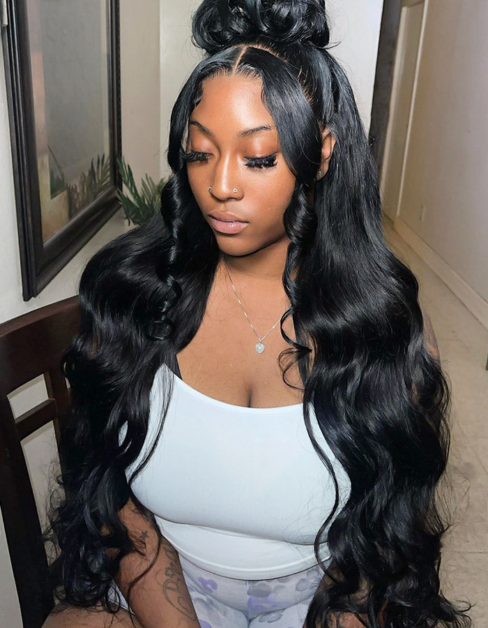 Model Showcasing Long Black Body Wave Human Hair Wig in Half-Up Hairstyle