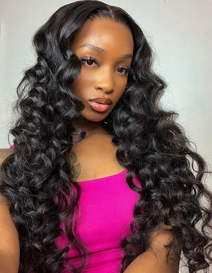 Woman Showcasing Loose Deep Wave Full Lace Wig in Natural Black Color