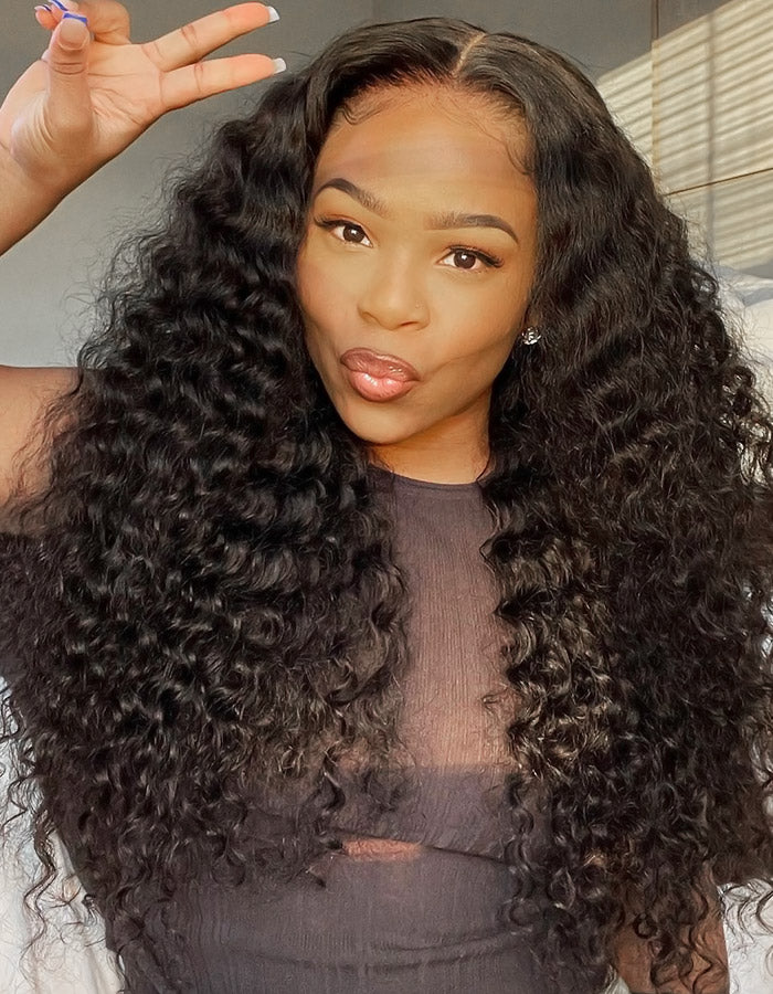 Woman With Deep Wave Wig, Demonstrating a Stylish Look and Natural Appearance