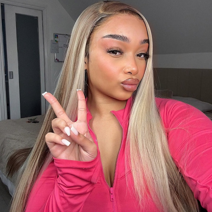 Model With Long Blonde Straight Hair Wearing a Pink Zip-Up Top, Making a Peace Sign