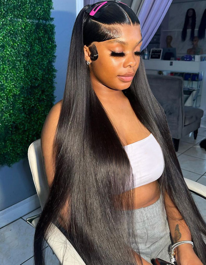 Woman With Long Straight Hair in Salon, Wearing a Crop Top and Hair Clip