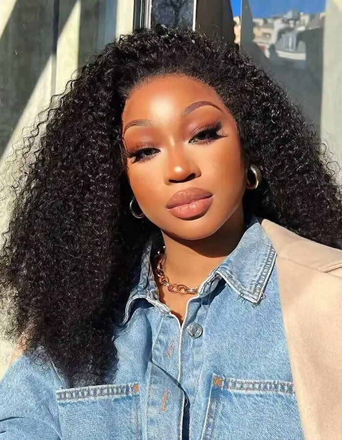 Woman in Denim Jacket Flaunting Voluminous Kinky Curly Hairstyle