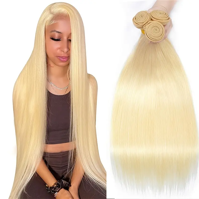 Model wearing long straight blonde wig next to three bundles of straight blonde Brazilian human hair 613 color from Ishow Hair