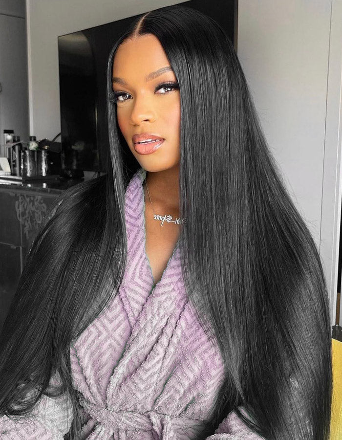 Model With Long Straight Black Hair Wearing a Robe, Showcasing Sleek Hairstyle