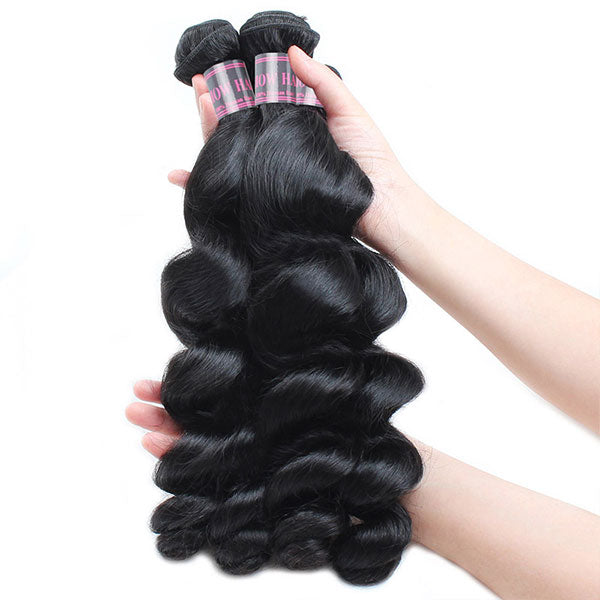 Three Brazilian Loose Wave Human Hair Bundles Held in Hand, Smooth and Shiny