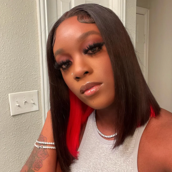 Woman Wearing Short Straight Bob Wig With Peekaboo Red Highlights