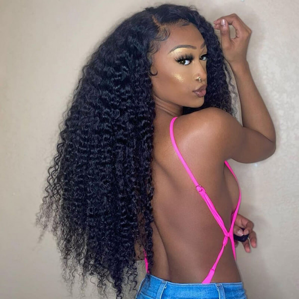 Back View of Model With Long Deep Wave Wig in Natural Curls, Wearing Pink Top