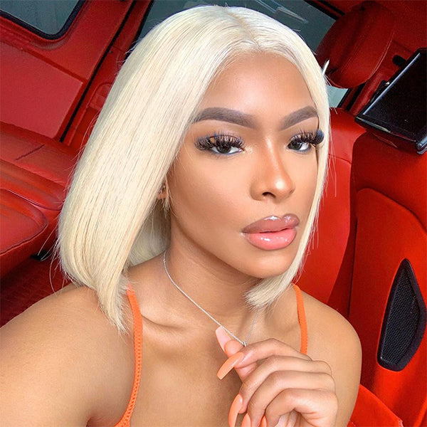 Woman Wearing Honey Blonde Bob Wig in Car Interior