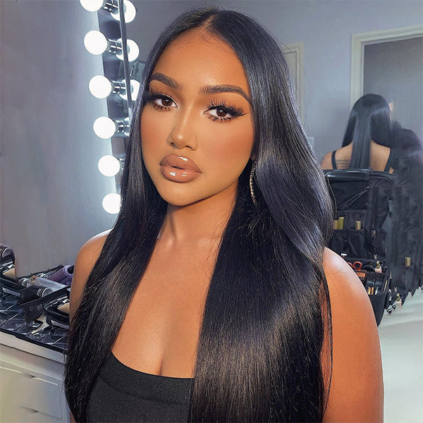 Model Displaying Sleek Straight Natural Black HD Lace Wig in Bright Vanity Lighting