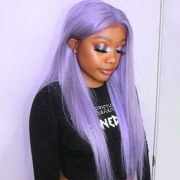 Stylish Model With Long Straight Light Purple Wig and Vibrant Eye Makeup