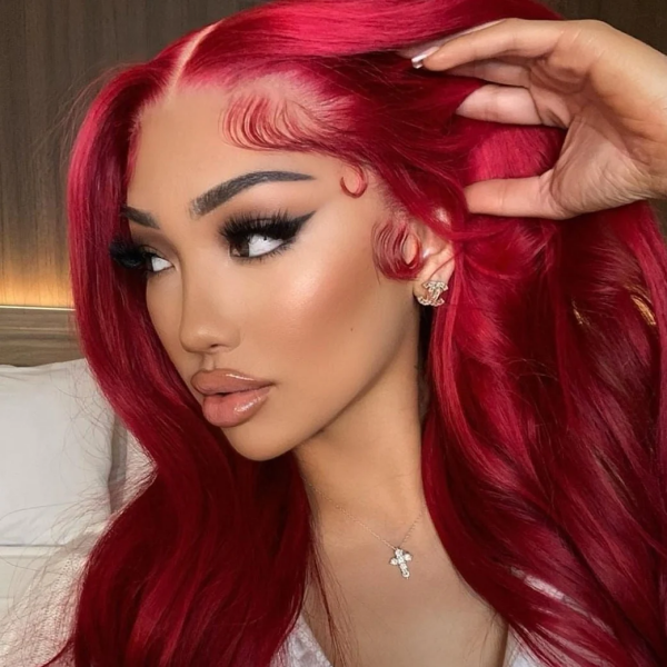 Model Showcasing Vibrant Red Body Wave Hairstyle With Smooth Texture and Shine