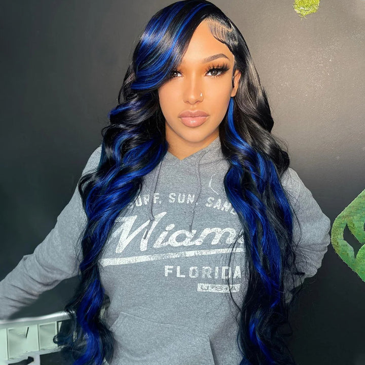 Model Showcasing Black Body Wave Wig With Gemstone Blue Highlights