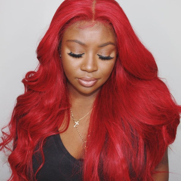 Woman Wearing a Vibrant Red Body Wave Wig With a Natural Hairline