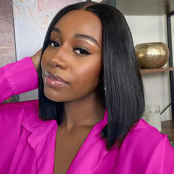 Woman With Straight Bob Wig and Glowing Skin in Pink Button-Up Shirt