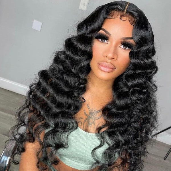 Close-up of 13x6 Loose Deep Wave Wig highlighting natural-looking pre-bleached scalp knots and middle part.
