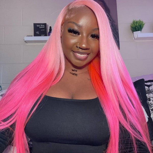 Woman With Long Barbie Pink Straight Hair, Smiling in a Black Top