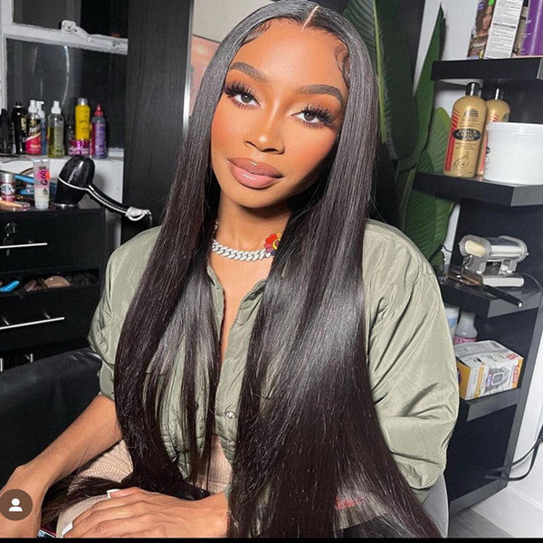 Woman With Long Straight Black Lace Wig in Beauty Salon Setting