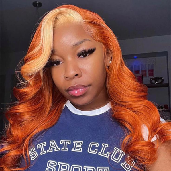 Woman With Vibrant Ginger Blonde Body Wave Wig Styled in Long Curls