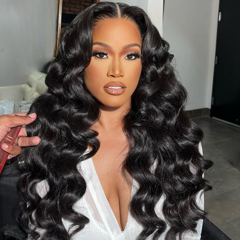 Model With Voluminous Wavy Black Hair, Styled for a Glamorous Look