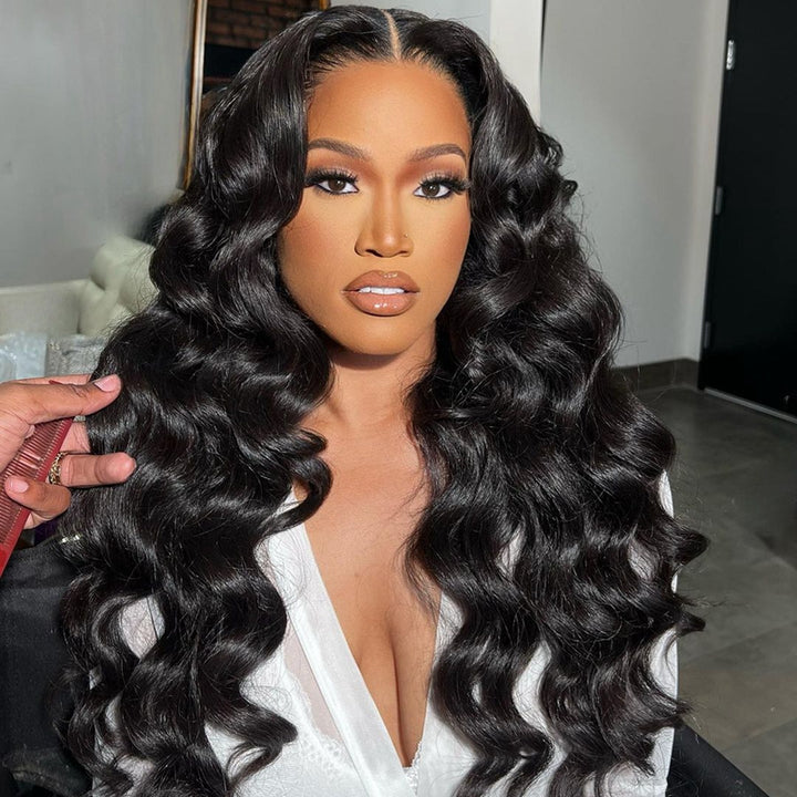 Model With Voluminous Wavy Black Hair, Styled for a Glamorous Look