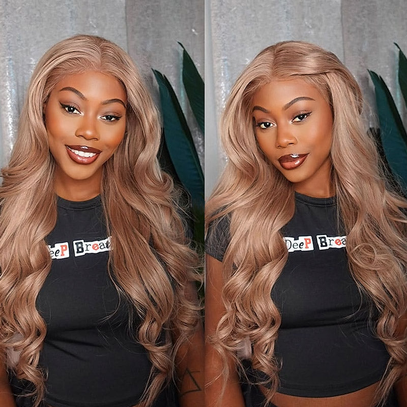 Woman showcasing Ishow Light Flaxen Brown #27 Colored Body Wave PPB™ Ready To Wear Human Hair Wig with invisible knots, wearing a blue top and hoop earrings
