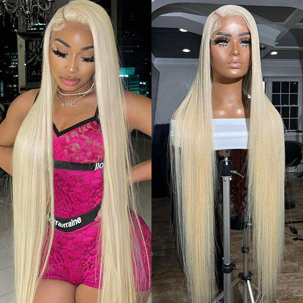 Person wearing a long, straight honey blonde human hair wig with HD transparent 13x4 lace front, dressed in a pink sweatshirt with white lettering.