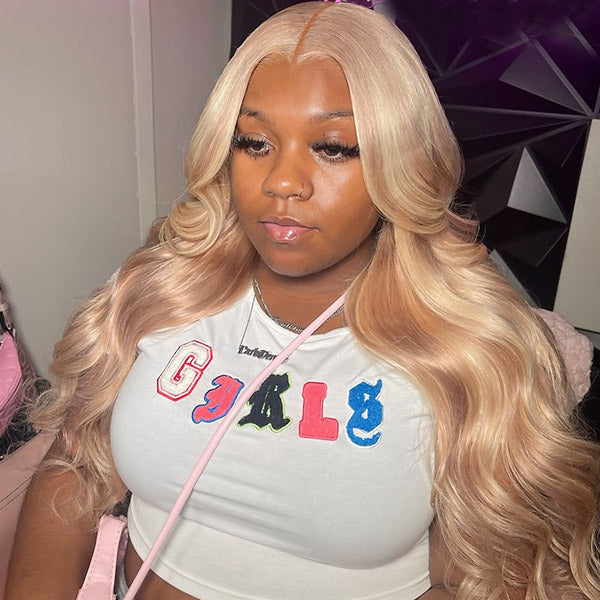 Body Wave Barbie Blonde Wig Styled in a High Ponytail On Model