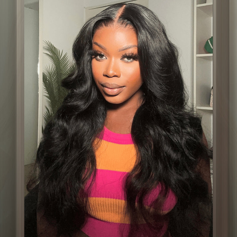 Model With Body Wave Hairstyle Wearing Vibrant Striped Top