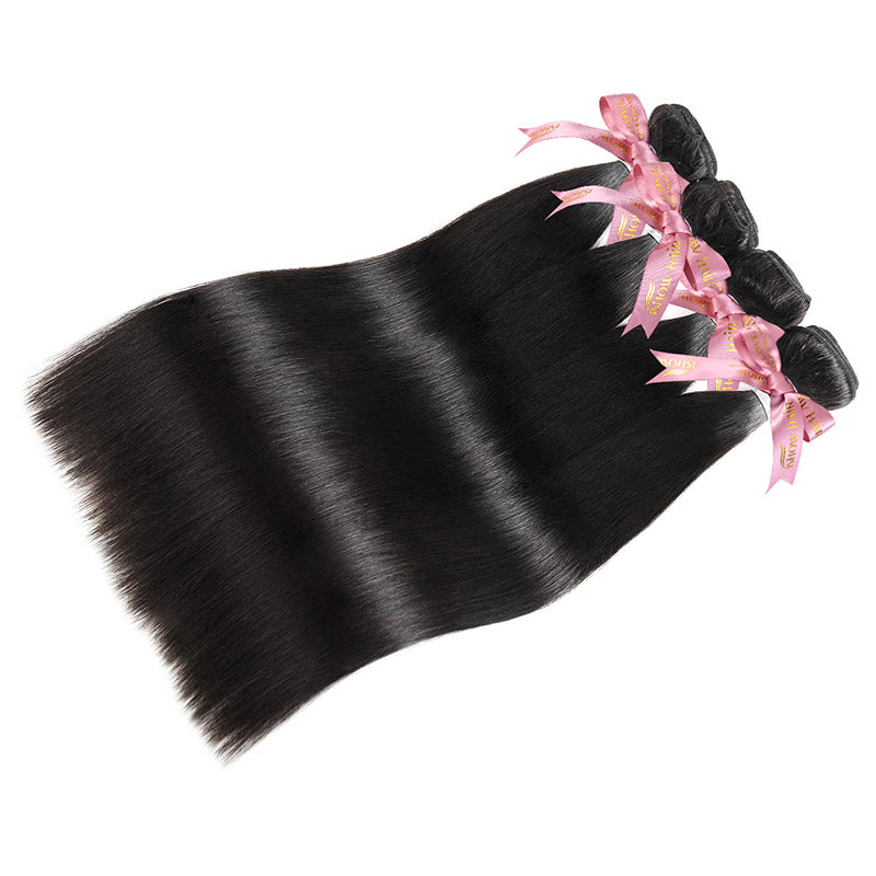 Four Straight Black Hair Bundles With Pink Ribbons, Showcasing Sleek Texture