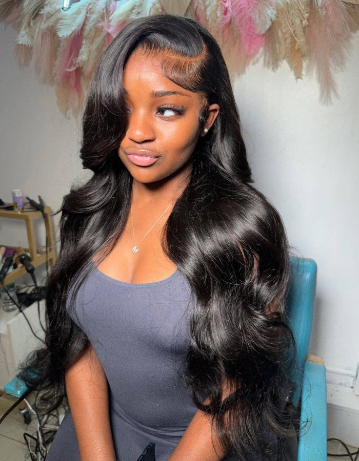 Model With Luxurious Long Body Wave Black Hair, Smiling in a Gray Tank Top