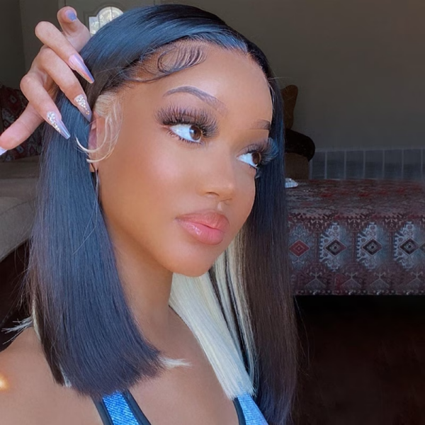 Stylish Model Flaunting a Straight Bob Wig With Blonde and Dark Highlights