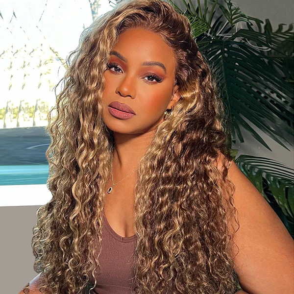 Honey Blonde Highlighted Glueless Wig With Loose Curls Worn By Model Indoors