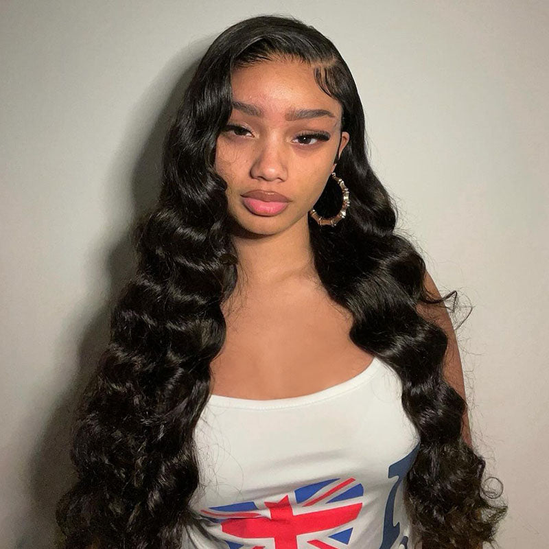 Model Showcasing Peruvian Loose Wave Hairstyle With Natural Texture
