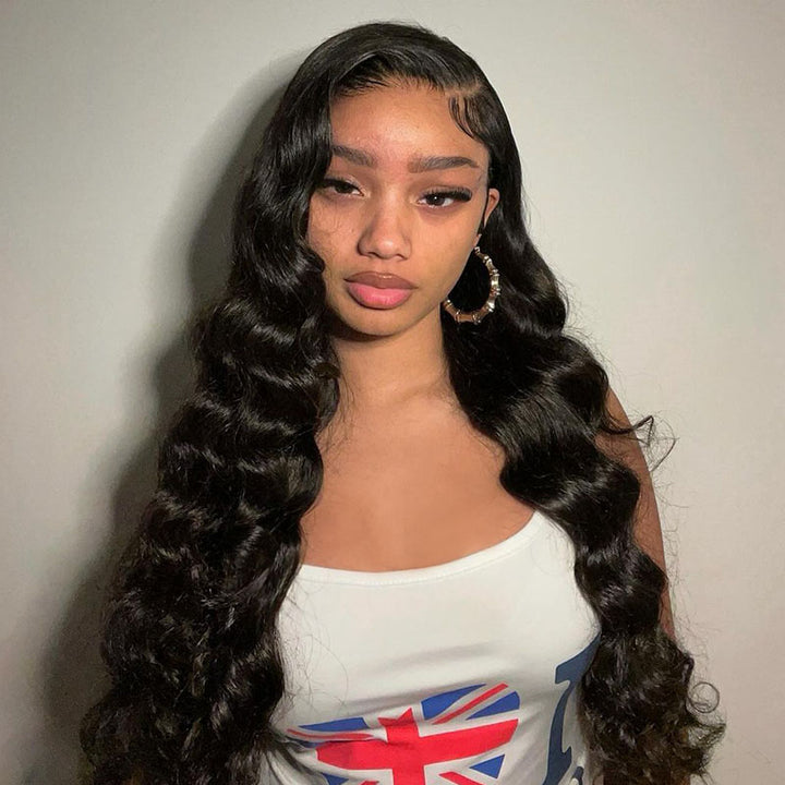 Model Showcasing Peruvian Loose Wave Hairstyle With Natural Texture