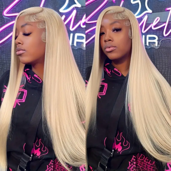 Model Showcasing 613 Blonde Straight Lace Front Wig in a Black and Pink Outfit