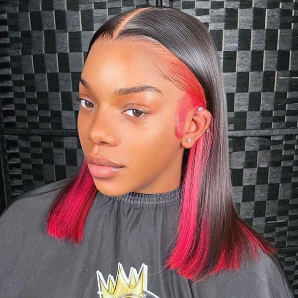 Model With Sleek Bob Wig Showcasing Vibrant Red Peekaboo Highlights