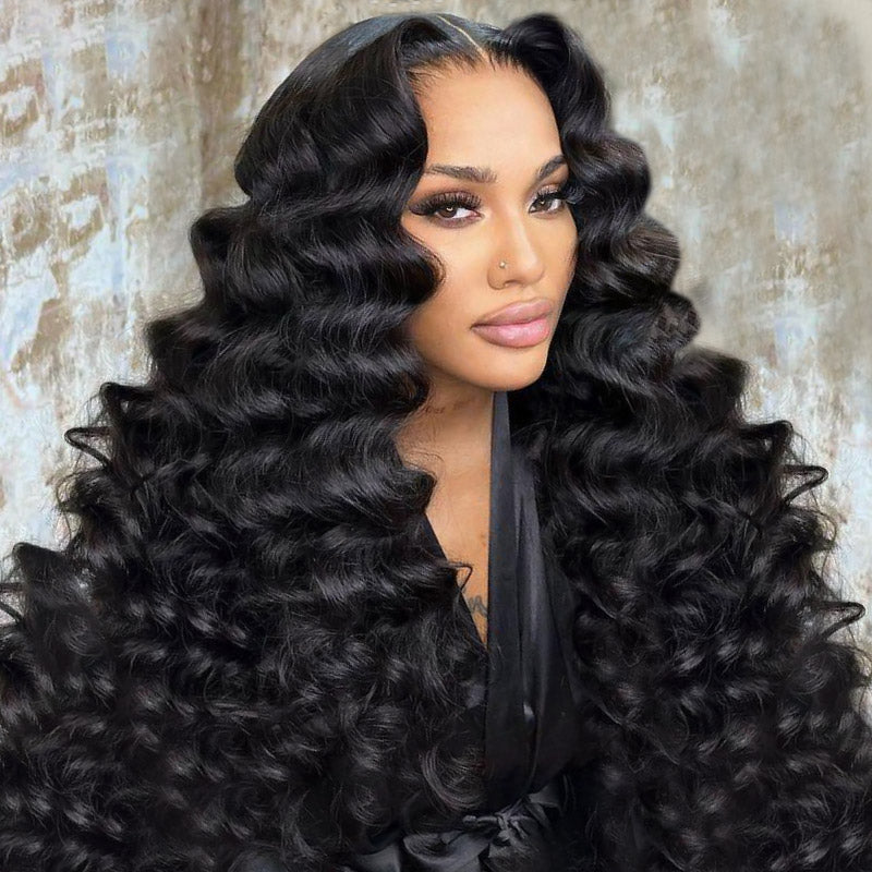 Model With Voluminous Loose Deep Wave Hairstyle in Natural Black Color