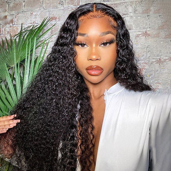 Woman With Long Water Wave Wig in Natural Black, Posing With a Stylish Look