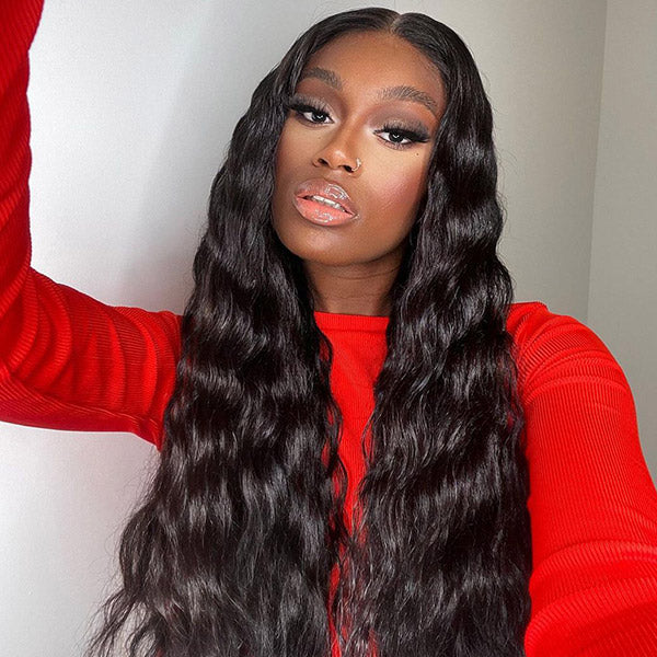 Woman With Long Loose Deep Wave Natural Black Hair Wearing a Red Top