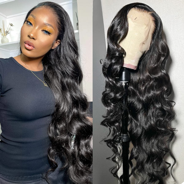 Woman with long body wave black hair wearing Ishow Beauty 13x6 lace front wig in a modern room setting.