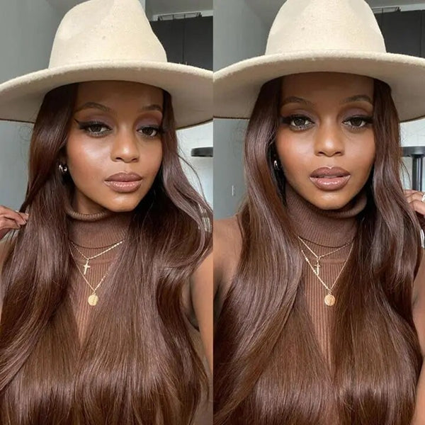 Model Wearing Brown Glueless Human Hair Wig With Long Wavy Hair and a Wide-Brimmed Hat