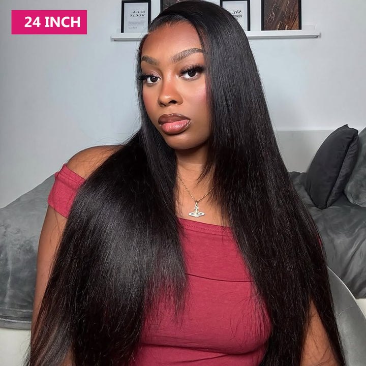 Woman with 24 inch yaki straight glueless half wig, sitting on a couch.