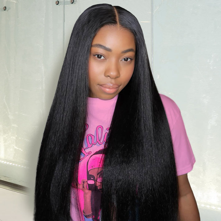 Wearing yaki straight glueless wig against a neutral background, showing great hair texture