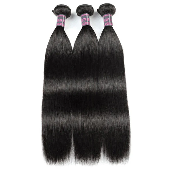Three Bundles Of Straight Black Hair Extensions On A White Background