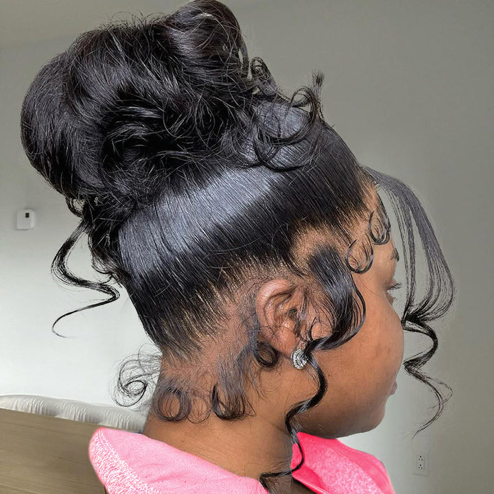 Side View of a Woman Showcasing a Body Wave Bun Hairstyle With Invisible Lace Frontal